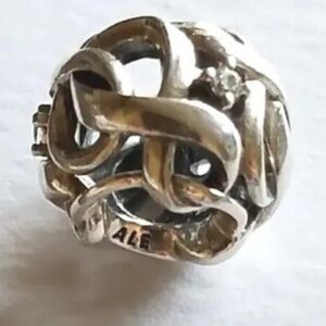 Pandora infinity knot charm bead
925 sterling silver